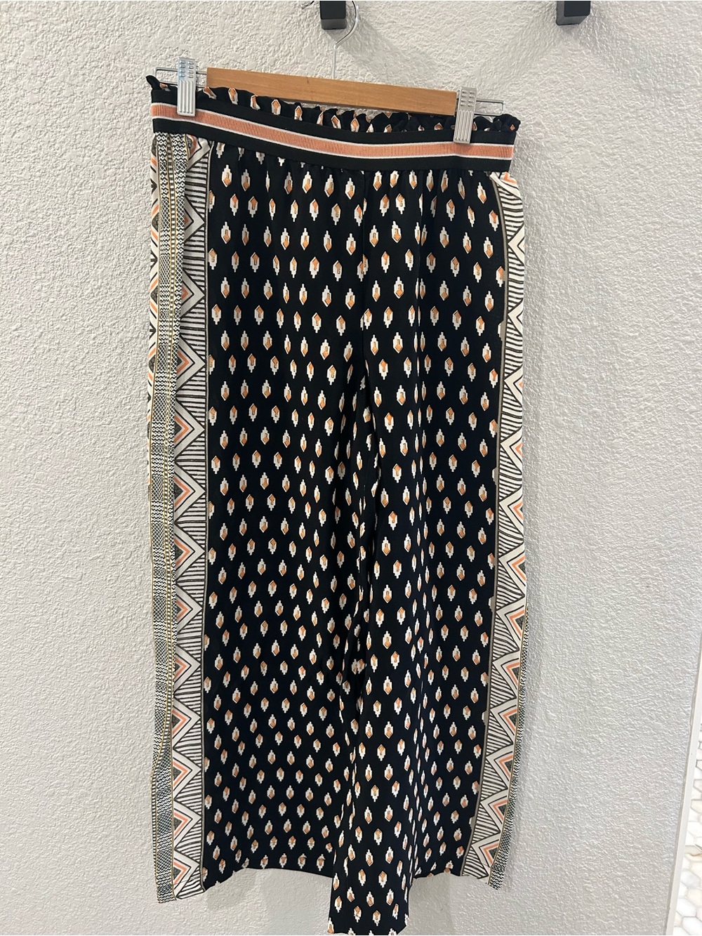 Maeve Black Wide leg pants with Peach and Cream Geometric Trim
